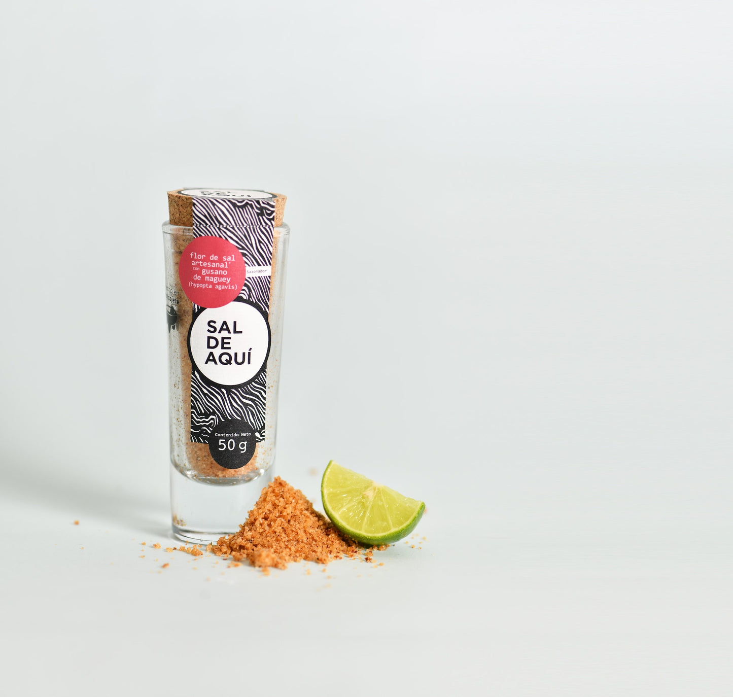 
                  
                    Flor de sal con gusano de maguey Sal de Aquí con limón y chile – condimento artesanal mexicano para mezcal y frutas
                  
                